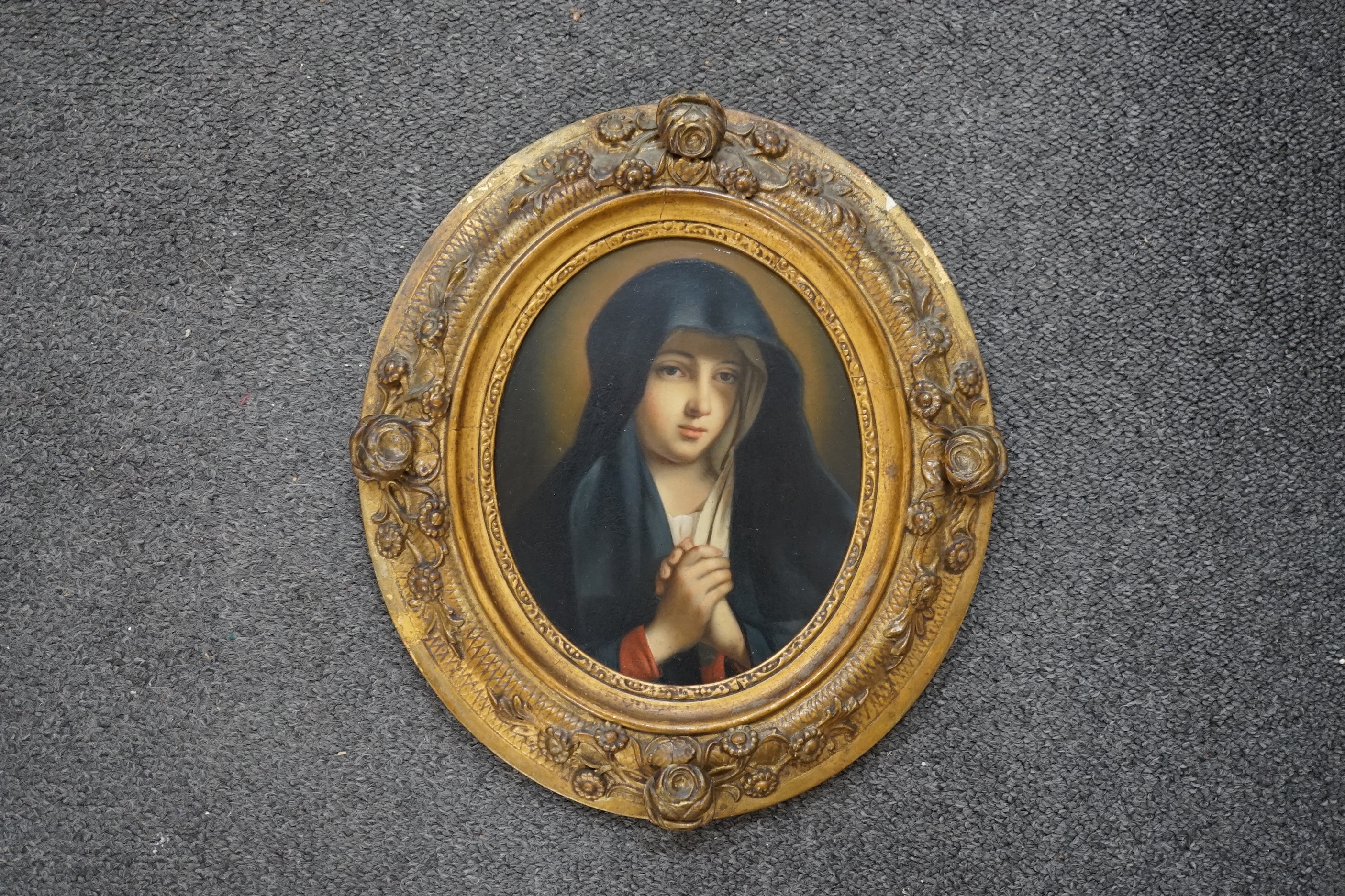 19th century school, oval oil on board, portrait of a nun at prayer, 16cm x 13cm ornate gilt frame